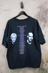 Women's or men's vintage 1999 O.B., Assembled in Mexico label short sleeve black Scorpions tour t-shirt with a colored graphic on front and back.