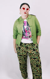 Women's vintage 1960's cropped style green cotton material button up lightweight jacket with 3/4 arm length.