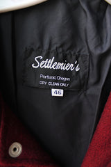 Men's or women's vintage 1980's Settlemien's label long sleeve maroon varsity letterman jacket with a yellow patch and trim.