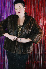 Women's vintage 1960's Fur Salon, M & T label long sleeve dark brown real fur evening jacket. No front closure, two side pockets and fully lined.