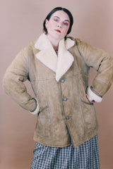 Men's or women's vintage 1970's Skinny's Hideout, Knight Tailors LTD. Australasia, Made in New Zealand label size large long sleeve tan brown suede medium length coat with cream shearling liner.