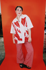 Men's vintage XL 1980's Yoyo's Hawaii, Made in USA label short sleeve white cotton shirt with collar and half button closure.