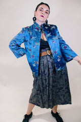 Women's vintage 1960's long sleeve vibrant blue satin robe jacket with a mandarin collar and overall ditsy print.