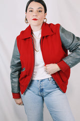 Men's or women's vintage 1960's Dick Longtin's Sports Huddle label long sleeve leather and wool zip up varsity letterman jacket in grey and red with pockets and nylon liner.