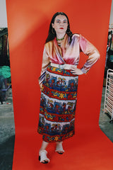 Women's vintage 1980's Impressions of California, Made in USA label long sleeve slinky silk like blouse with double breasted closure in orange, purple, and pink.