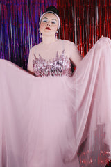 Women's vintage 1980's long sleeve long length pink maxi dress. Has sheer sleeves and sequins across the chest