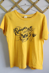 Women's vintage 1979 Russell Athletic label short sleeve yellow tee with black graphic on the front from The Rubinoos Tour 1979.