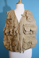 Men's or women's vintaGe 1980's Wild Life Brand, Fishing Vest label sleeveless light tan colored zip up vest in a cotton material. Has multiple pockets in the front.
