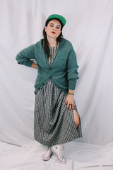 Women's or men's vintage 1970's Alps, Rugged Outdoors, Merrimac Valley, New England label long sleeve green colored button up cardigan.