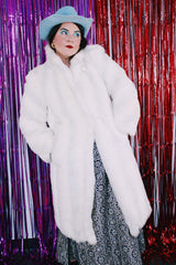 Women's vintage 1980's Avec Tu, A Luxury Fabric bu Glenoit, Union Made, Made in USA label long sleeve long length bright white faux fur coat.