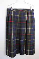 Women's vintage 1980's Dalton, Union Made, Made in USA label midi length plaid printed skirt in navy with white and red stripes.