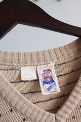 Men's or women's vintage 1970's Kennington California LTD. label sleeveless tan colored V shaped neckline sweater vest with dotted print all over in a soft acrylic material.