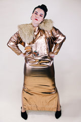 Women's vintage 1980's Original by Freida label long sleeve long length bronze metallic costume dress with a bib in front and back.