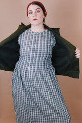 Men's vintage 1950's Caleb V. Smith & S, New York label size large dark green wool cropped fit long sleeve button up jacket with brown shearling liner.