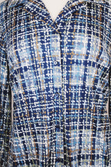 Women's vintage 1970's Mr. Alex, a division of Alex Colman Inc. label long sleeve button up blouse with dagger collar in all over white and blue colored abstract print.