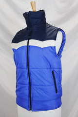 Women's or men's vintage 1970's Sears, Boys label sleeveless puffy vest in white, navy, and blue. Side pockets and zipper up the front.
