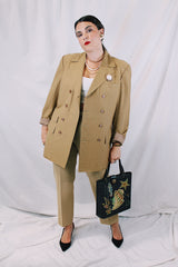 Men's or women's vintage 1970's Sax Overseas, Specially Made For Mr. R. E. Bankhead long sleeve beige colored double breasted blazer with thin pin stripes throughout.