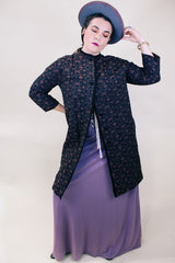 Women's vintage 1960's Helen's Fashion Shoppe, McMinnville, Oregon label long sleeve long length jacket in a black and purple tapestry print.