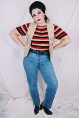 Women's vintage 1990's BB Dakota Leatherwear label light tan colored suede leather vest with fringe detail and silver buttons