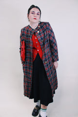 Women's vintage 1960's long label long length plaid tartan print jacket in black and red with gold buttons. Fully lined and has side pockets.