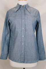 Women's vintage 1970's Maverick, Made in USA label long sleeve light blue chambray button up blouse with a western style.