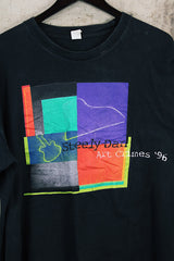 Women's or men's vintage 1996 Made in El Salvador label short sleeve black Steely Dan tour tee with multicolored graphic on front and back.
