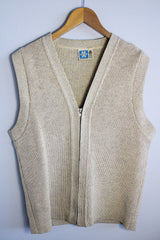 Men's or women's vintage 1970's Norsewear, Made in New Zealand label sleeveless zip up wool material vest in an oatmeal cream color. Ribbed texture all over.