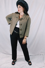Women's vintage 1950's Harold, Monte-Sano & Pruzan, New York label nubby wool textured grey colored jacket with big grey buttons and small peter pan collar.
