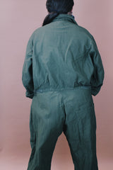 Men's vintage 1980's Men's Coveralls Type 1 label size XL long sleeve army green one piece jumpsuit with button closure and pockets in cotton material.