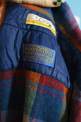 Men's or women's vintage 1970's Lobo, Pendleton label long sleeve button up shirt in a wool material in a tan, blue, and burn orange plaid print.