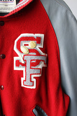 Men's or women's vintage 1980's DeLong, Made in USA label long sleeve dark red and grey varsity letterman jacket with patches and pins. Wool and leather material.