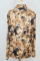 Men's vintage 1970's D'Avila label long sleeve button up shirt in all over abstract orange and green abstract print in slinky polyester material.
