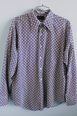 Women's or men's vintage 1970's Forum Collection label long sleeve button up shirt in white with all over navy and red abstract print.