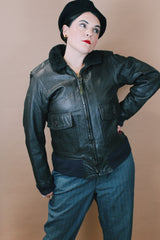 Men's vintage 1960's Jacket, Flyer's, Intermediate Type G-1 (from the Vietnam War) size medium chocolate brown zip up bomber leather jacket with faux fur trim collar.