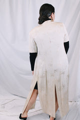 Women's vintage 1990's R & M Richards by Karen Wong label short sleeve long length duster dress in a cream satin like material. Long side slits, mandarin collar, and fabric covered buttons.