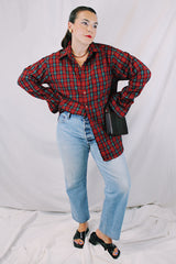 Men's or women's vintage 1980's Pendleton label long sleeve button up shirt in an all over red plaid print. Lightweight wool material, tortoise buttons.