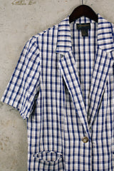 Women's vintage 1980's Requirements label short sleeve lightweight plaid print blazer in cream, white, and navy blue.