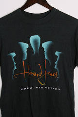 Women's or men's vintage 1985 Star Prints, Made in USA label short sleeve black Howard Jones Band tour tee with graphic on front and back in a cotton material.