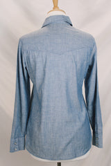 Women's vintage 1970's Maverick, Made in USA label long sleeve light blue chambray button up blouse with a western style.