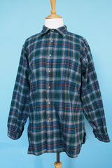 Men's vintage 1980's Pendleton, Made in USA label long sleeve plaid print button up shirt with tan elbow pads. Green and blue colors in a wool material.