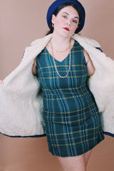 Men's or women's vintage 1970's Montgomery Ward label size medium long sleeve dark wash denim jacket with cream colored shearling liner.