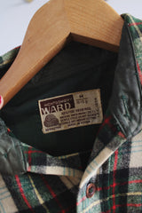 Men's vintage 1970's Montgomery Ward label size medium long sleeve wool button up shirt in cream and dark green colors. Has two chest pockets