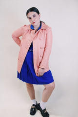 Women's vintage 1970's peach pink colored leather double breasted pea coat. Double lapel, pockets, and fully lined.