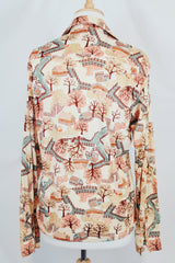 Men's or women's vintage 1970's long sleeve cream colored polyester button up shirt with all over multi colored tree print shirt.