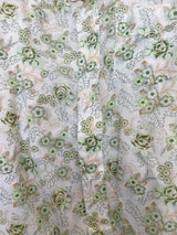 Men's or women's vintage 1970's Sutton Place label long sleeve button up shirt in white with all over green floral print.