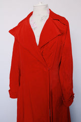 Women's vintage 1950's/60's Count Romi LTD., Your All Weather Traveler label long sleeve long length bright red velvet duster coat. One closure at waist.