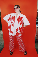 Men's vintage XL 1980's Yoyo's Hawaii, Made in USA label short sleeve white cotton shirt with collar and half button closure.