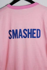 Women's vintage 1970's Chippie, Made in Bahamas label short sleeve bubblegum pink tee with a yellow and blue bee graphic on the front with a contrast trim.