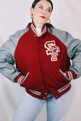 Men's or women's vintage 1980's DeLong, Made in USA label long sleeve dark red and grey varsity letterman jacket with patches and pins. Wool and leather material.