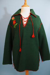 Women's vintage 1970's Indian, Handcrafted by Canadian Indians label long sleeve forest green pullover sweater with a collar and tie front.